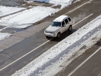 The snow removal strategy for downtown Dayton involved creating boulevards in the middle of the street.