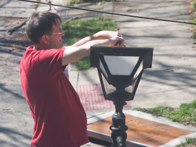 The street lamp in front of my building stopped working.  An Oregon District resident (not a city employee) fixed it.