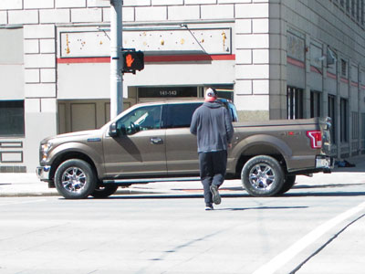 Crosswalks downtown are dangerous enough without walking into traffic against the light.