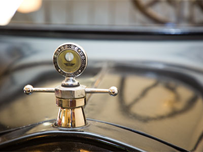 The hood ornament started out as an engine gauge.