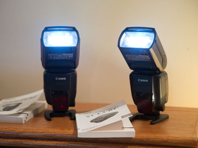 I had to consult two owners manuals, but I finally got these two flashes to work together with my camera.