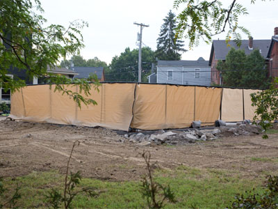 A swimming pool with a huge fence like a cemetery (see June 9, 2021).