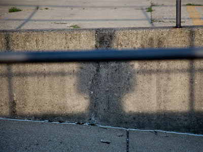 I was planning to take pictures of a jazz performance tonight, but it was canceled -- so you get my shadow.