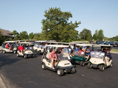 When 64 golf carts start off, just stay out of the way.