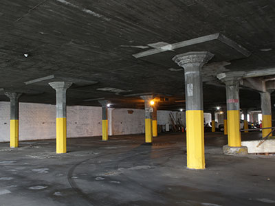 Painting a column yellow won`t prevent someone from driving into it.