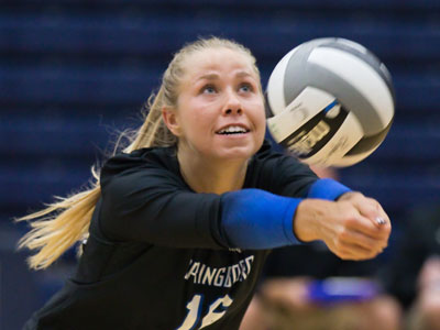 By sitting close to the court, I can get good action shots -- and I can also get a ball in the face.