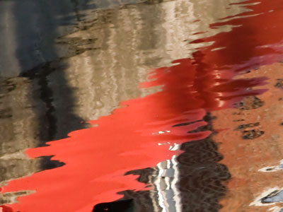 An ugly construction site looks better reflected in a pool.