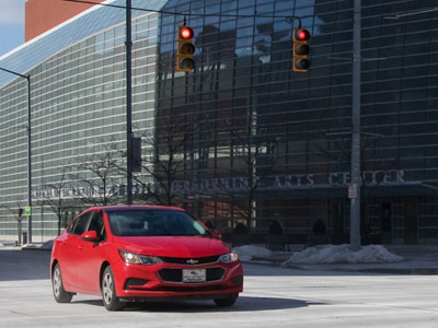 Attracted by the red lights, the red car sped on.