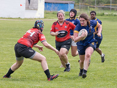 Another activity was canceled because of rain today, so that left me free to take pictures of rugby.