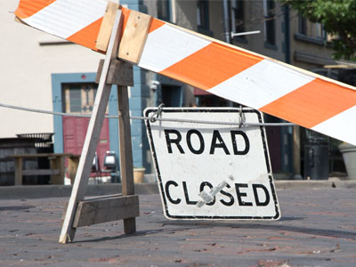 Every weekend from April through October, streets in the Oregon District are barricaded.  What`s good for the restaurants and shops is bad for the residents.