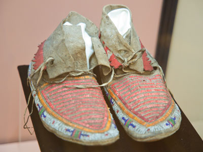 At the Dunbar House is a pair of moccasins that Paul purchased for $1.75 at a curio shop in Denver in 1900.