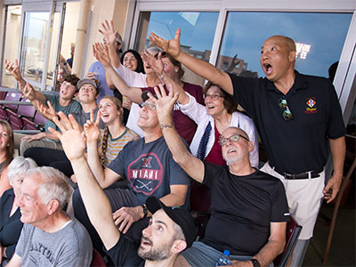 Guess which one caught the foul ball.