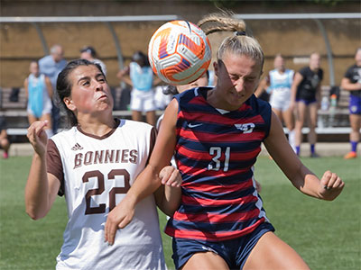 Only the ball girls and referees were closer to the field than I was.