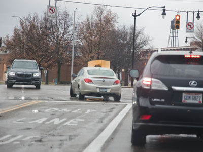 On a similar note, here is the Idiot Driver of the Day (notice the red light and no left turn sign).