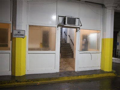 I loitered long enough to take a photo in my creepy parking garage.  The floor is wet, and there are no rugs.