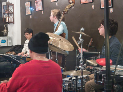 I went to a jazz jam at a little coffee shop, but it was way too crowded.  This was taken through the front window.