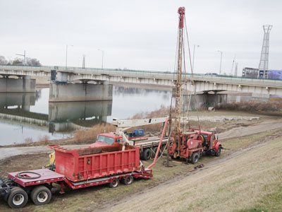 Things I can`t explain:  water was being pumped out of the ground and into the red container.