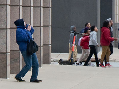 Gems of the Gem City:  crazy guy yells at kids on their way to a concert.