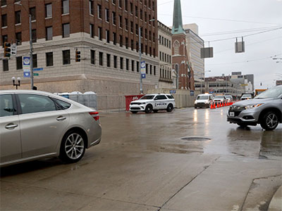 My daily trip through no-man`s-land of the crosswalk.  Only two cars tried to run me over, with a cop nearby.