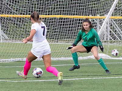 Dara Russo breaks through the defense and scores for Dayton.