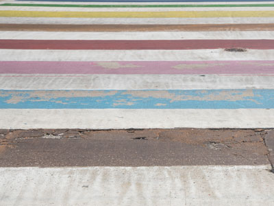 Stopping to take a photo of this colorful crosswalk kept me from getting run over by a car that ran the red light.