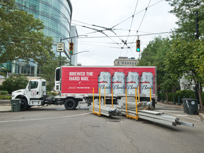 I can jaywalk safely thanks to a beer truck.