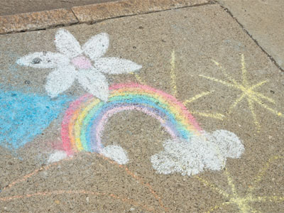 It`s impossible to be sad and draw a chalk rainbow.