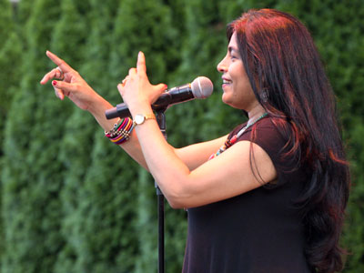 She taught the audience to sing a 3,000 year old Indian song.