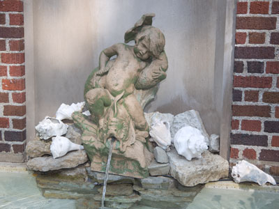 I visited a large Oakwood home that had many fountains.