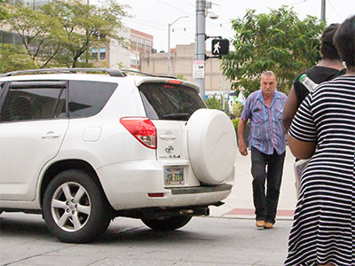 Just another day of sharing the crosswalk with cars.