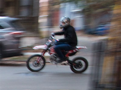 In Dayton, a motorcycle gang consists of kids on dirt bikes and scooters popping wheelies.