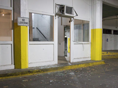 Broken glass and blood:  the parking garage residents are getting unruly.