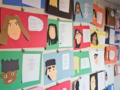 Inspired by Dunbar, local students created self-portraits and wrote poems about how they wear the mask.