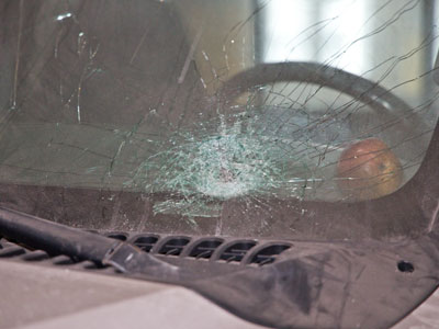 More broken glass in my parking garage, but no blood this time (see December 5, 2023).