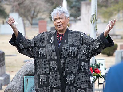 Beside Dunbar`s grave, we lifted every voice and sang.