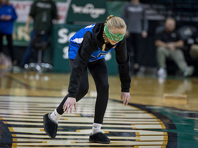 This was cruel:  pizza boxes were placed on the court and she had to find them blindfolded.  She didn`t.