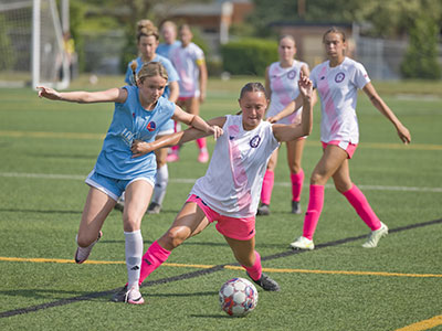 If they can play soccer in the sun when it`s 93 degrees, then I can stand there and take pictures of them doing it.