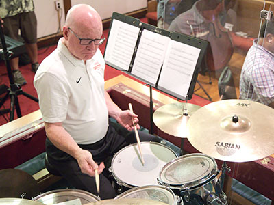 Jim Leslie provided rhythm in the rhythm section.
