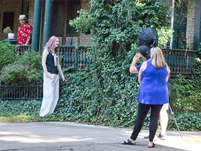 A common hazard in the Oregon District:  walking into the background of someone`s photo shoot.