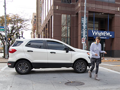 A car made an illegal turn and almost ran me over, then another one did the same thing to her.