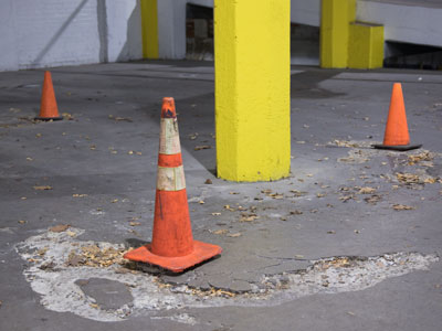 The latest crisis in my parking garage:  the floor is crumbling (see December 31, 2024).