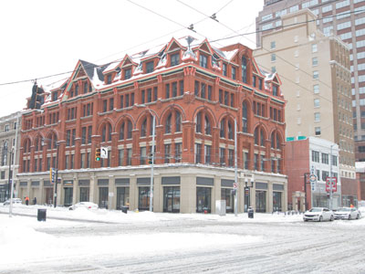 Today on Facebook, somebody posted a photo of this building after a 1978 blizzard. I walked through harsh wind and deep snow in order to recreate that picture.