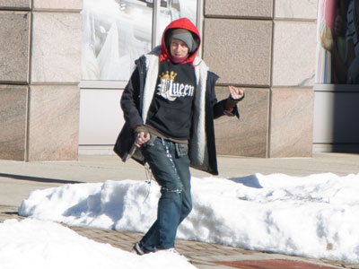 It`s never too cold for a little air guitar on the sidewalk.