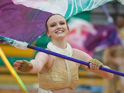 I sat in front of the judges and heard them critique the shows in real time.  I learned a lot about color guard.