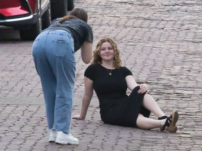 Put on a nice dress and sit in the street and I`ll take your picture.
