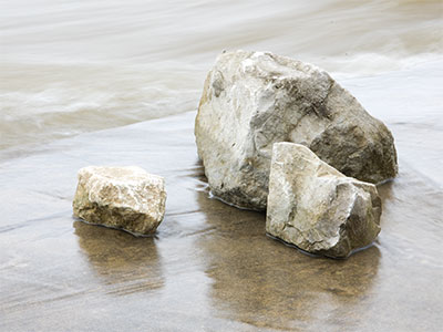 Between a rock and a wet place.
