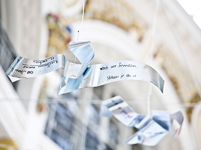 An art installation called Think Freedom is hanging suspended above the Dayton Arcade rotunda.