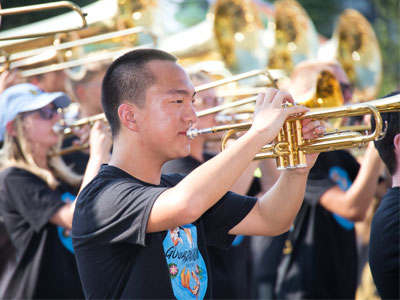 This guy asked me to take his pictures and I said, `It`s all about the trumpets.`
