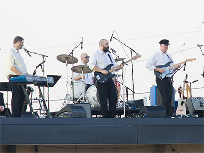 Four lads on a roof.  It`s the latest thing.