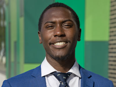 Random guy wanted a new headshot on the sidewalk. Random guy wanted a new headshot on the sidewalk.